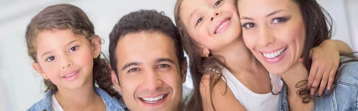Smiling family at Spicewood Dental in Austin, Texas providing gentle, modern family dentistry