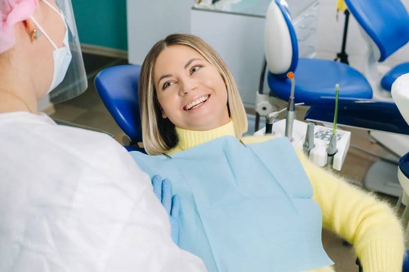 Patient smiling during cosmetic dentist consultation at Spicewood Dental in Austin, TX